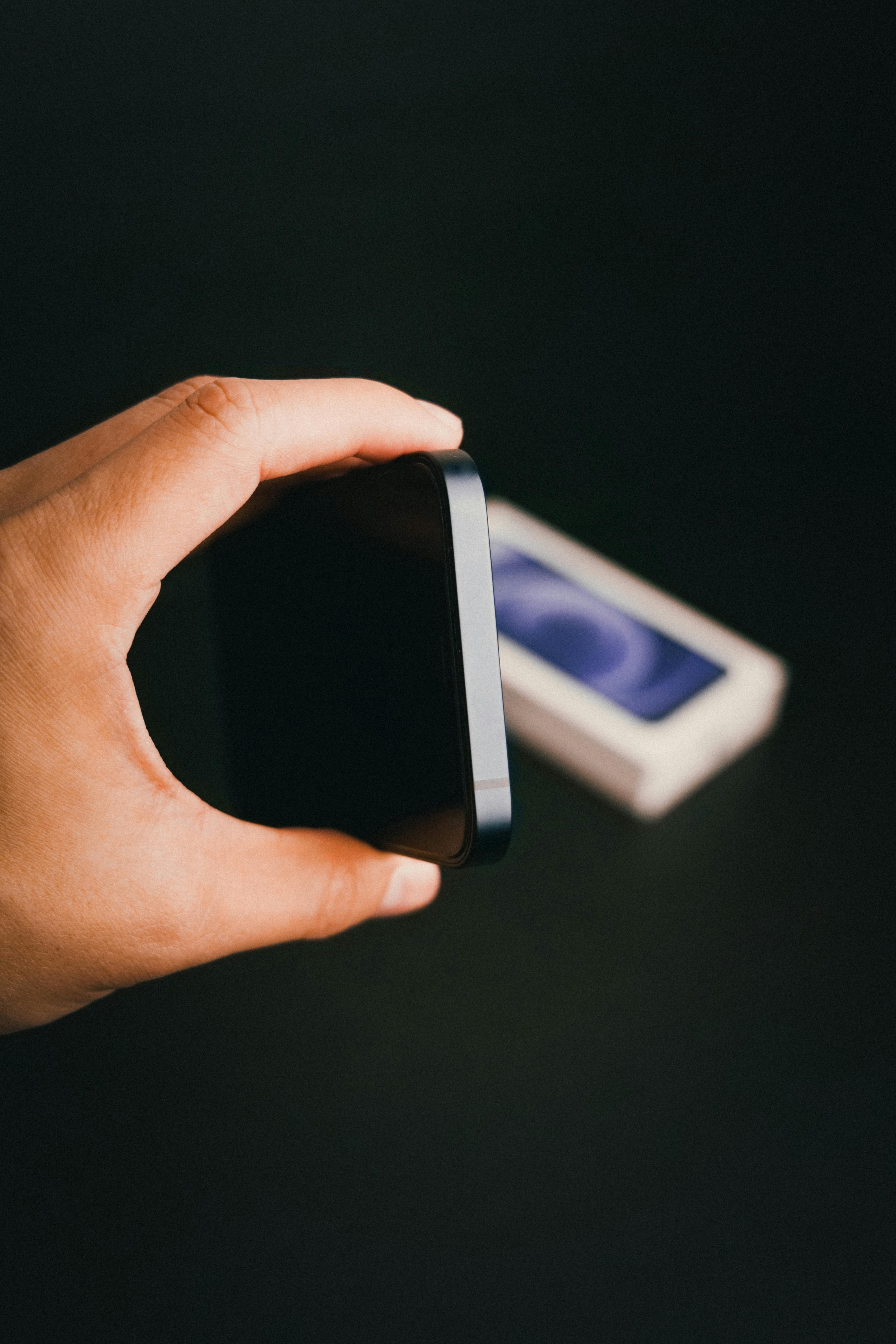 hand holding a mobile phone